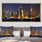 Designart - New York Skyline at Night - Cityscape Photo Framed Canvas Print